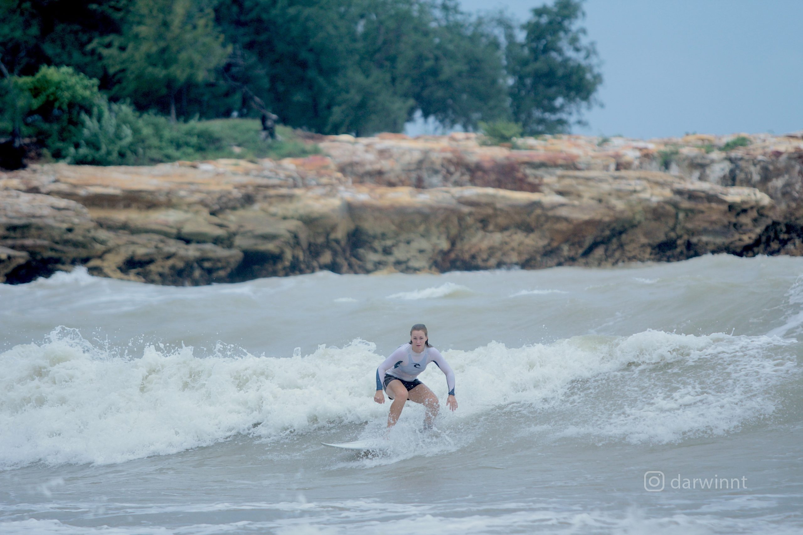 Nightcliff surfer during wet season stormy weather